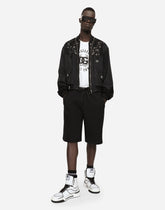 Nylon jacket with lace inserts and DG patch -  | Dolce & Gabbana