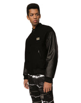 Wool jacket with faux leather sleeves and tag -  | Dolce & Gabbana