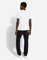 Regular blue denim jeans with abrasions and rips -  | Dolce &amp; Gabbana
