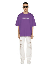 Jeans with rips, abrasions and DGVIB3 patch -  | Dolce & Gabbana