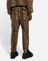 Jogging pants with leopard-print Crespo and tag -  | Dolce &amp; Gabbana