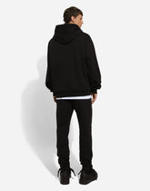 Jogging pants with rhinestone-detailed DG patch -  | Dolce &amp; Gabbana