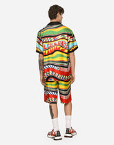 Silk twill jogging shorts with carretto print -  | Dolce & Gabbana