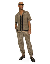 Crepe de chine jogging pants with logo print -  | Dolce &amp; Gabbana