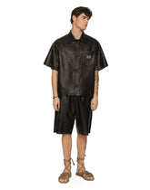 Openwork leather Bermuda jogging pants with brand plate -  | Dolce & Gabbana