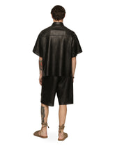 Openwork leather Bermuda jogging pants with brand plate -  | Dolce & Gabbana