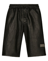 Openwork leather Bermuda jogging pants with brand plate -  | Dolce & Gabbana