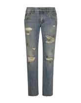 Washed denim jeans with rips -  | Dolce &amp; Gabbana