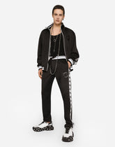 Jogging pants with DG logo and bands -  | Dolce &amp; Gabbana