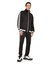 Jogging pants with DG logo and bands -  | Dolce & Gabbana