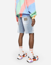 Light blue denim shorts with DG patch -  | Dolce & Gabbana
