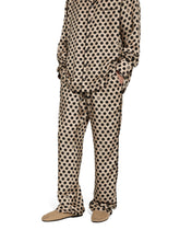 Silk jogging pants with polka-dot print and DG logo -  | Dolce &amp; Gabbana