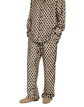 Silk jogging pants with polka-dot print and DG logo -  | Dolce & Gabbana