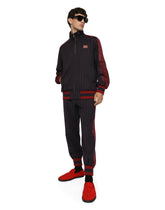 Pinstripe jogging pants with branded bands -  | Dolce & Gabbana