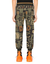 Jogging pants with all-over logo print -  | Dolce & Gabbana