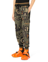 Jogging pants with all-over logo print -  | Dolce & Gabbana