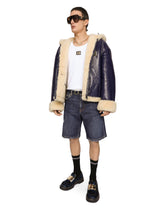 Blue denim shorts with rips and embroidery -  | Dolce & Gabbana