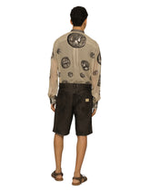 Washed denim Bermuda shorts with rips -  | Dolce & Gabbana
