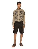 Washed denim Bermuda shorts with rips -  | Dolce & Gabbana