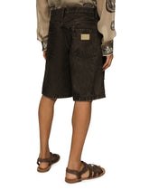 Washed denim Bermuda shorts with rips -  | Dolce & Gabbana