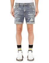 Stretch denim shorts with rips -  | Dolce & Gabbana