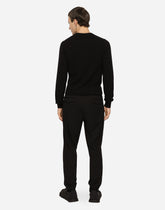 Stretch wool round-neck sweater with DG hardware -  | Dolce &amp; Gabbana