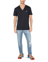 Light blue slim-fit stretch jeans with micro-rips -  | Dolce & Gabbana