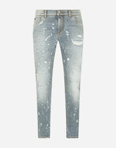 Slim-fit blue wash stretch jeans with abrasions -  | Dolce &amp; Gabbana
