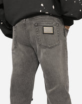 Gray slim-fit stretch jeans with rips -  | Dolce &amp; Gabbana