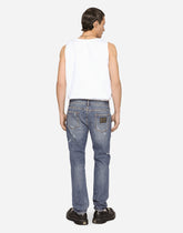 Mid blue slim-fit stretch jeans with rips -  | Dolce &amp; Gabbana