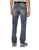 Light blue slim-fit stretch jeans with abrasions -  | Dolce & Gabbana