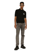 Light gray slim-fit stretch jeans with rips -  | Dolce & Gabbana