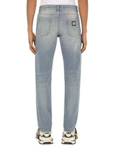 WASHED STRETCH DISTRESSED SLIM  JEANS -  | Dolce & Gabbana