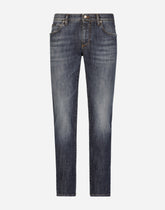 Slim fit washed stretch jeans with subtle abrasions -  | Dolce & Gabbana