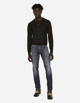 Slim fit washed stretch jeans with subtle abrasions -  | Dolce & Gabbana