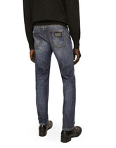 Slim fit washed stretch jeans with subtle abrasions -  | Dolce & Gabbana