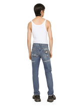Slim fit stretch denim jeans with subtle abrasions -  | Dolce & Gabbana
