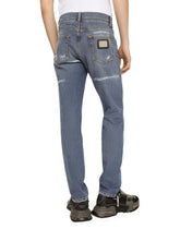 Slim fit stretch denim jeans with subtle abrasions -  | Dolce & Gabbana