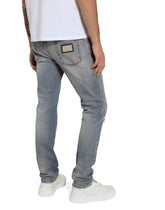 Slim-fit blue stretch denim jeans with abrasions -  | Dolce & Gabbana