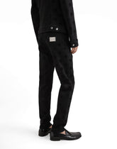 Slim-fit stretch cotton jeans with tag -  | Dolce &amp; Gabbana