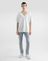 Slim-fit stretch cotton jeans with tag -  | Dolce &amp; Gabbana