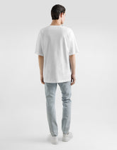 Slim-fit stretch cotton jeans with tag -  | Dolce &amp; Gabbana