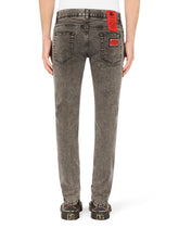 Gray wash skinny stretch jeans with patch detailing -  | Dolce & Gabbana