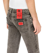 Gray wash skinny stretch jeans with patch detailing -  | Dolce & Gabbana