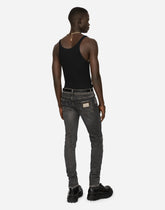 Gray skinny stretch jeans with rips -  | Dolce &amp; Gabbana