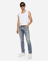 Light blue skinny stretch jeans with rips -  | Dolce &amp; Gabbana