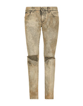 Overdyed skinny fit stretch jeans with rips -  | Dolce & Gabbana