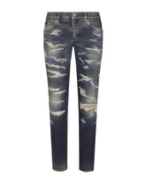 Skinny stretch denim jeans with abrasion details -  | Dolce &amp; Gabbana