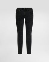 Skinny jeans in stretch cotton with plaque -  | Dolce &amp; Gabbana