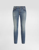 Skinny stretch cotton jeans with tag -  | Dolce &amp; Gabbana
